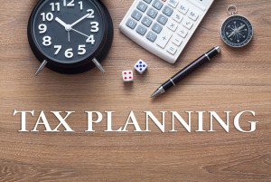 Clock and Calculator with Tax Planning Text